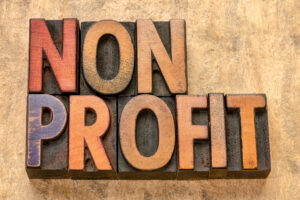 nonprofit word in wood type